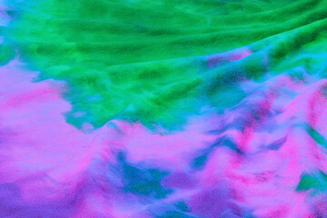 Fototapeta na wymiar Abstract tie dye neon multicolor folded fabric cloth boho pattern texture for background, sale flyer, 60s, 70s, 80s, 90s retro poster, tie-dye diy backdrop. Modern Watercolor wapor wave, Fabrics Art