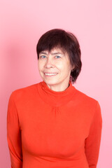 portrait of a woman on a pink background