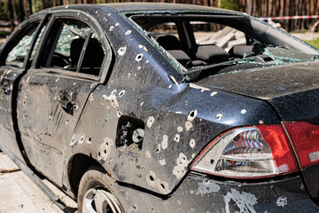 Many shot and destroyed cars at the car graveyard in Irpin, Ukraine.