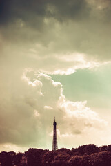 Cloudy skies above Eiffel Tower in Paris