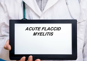 Acute Flaccid Myelitis.  Doctor with rare or orphan disease text on tablet screen Acute Flaccid Myelitis - obrazy, fototapety, plakaty