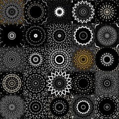 black and white and shades of grey grid dot and spot pattern with green contrasting portions snowflake style