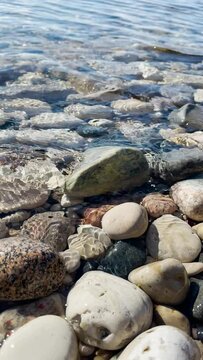 Petoskey Stones Wade in the Shallow Lake Michigan waters with calming background water sound