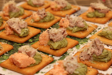 Traditional spanish tapas with tomatoes, mozzarella cheese, avocado and mushrooms. chips tortillas snacks
