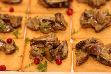 Traditional spanish tapas with tomatoes, mozzarella cheese, avocado and mushrooms. chips tortillas snacks