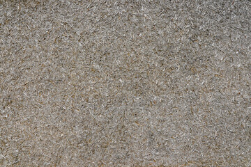 Pressed wood textured grey brown background