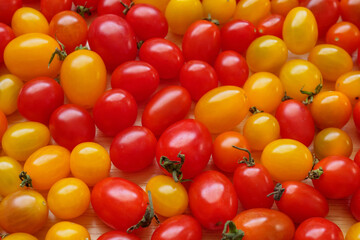 Variety of colorful organic tomato background