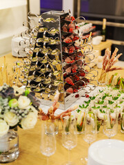 Various appetizers arranged on a banquet rack