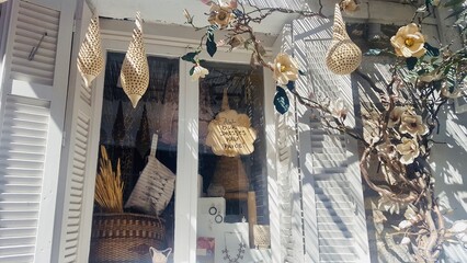 Colorful decorations of Greek shops on the streets in the national style on the island of Skiathos,...