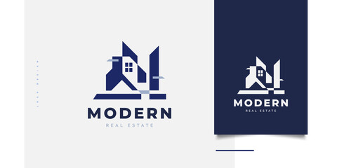 Blue Modern House Logo Design for Real Estate Business Identity. Abstract Building Icon. Architecture or Construction Industry Logo