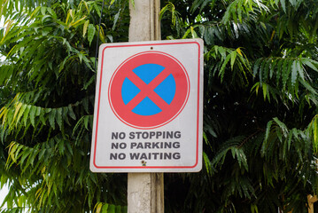 Road warning sign for no stopping no parking no waiting