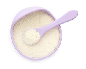 Dry healthy baby food in bowl on white background, top view