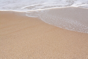 Fototapeta na wymiar Beautiful view of sandy beach and sea. Summer vacation