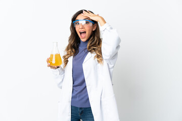 Young scientific woman isolated on white background doing surprise gesture while looking to the side