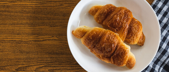 Banner Picture of Croissants Served on Table in Restaurant for Breakfast