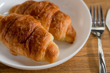 Close up of Croissants Served on Table in Restaurant for Breakfast