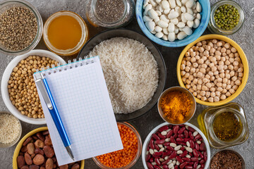 Vegetarian food and diet food concept with legumes, cereals and herbs