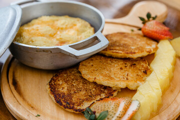 Delicious breakfast with egg and corn cake