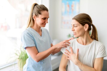 Modern rehabilitation physiotherapy woman worker with woman client