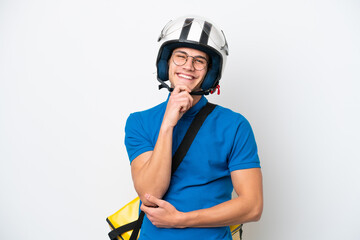 Young caucasian man with thermal backpack isolated on white background with glasses and smiling