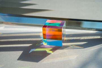 Abstract background with multicolored transparent prism