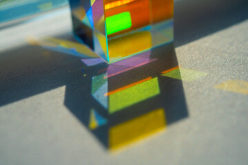 Abstract background with multicolored transparent prism