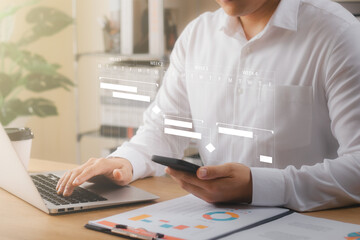 concept of time management and human resources Effectively, male businessman using a laptop...