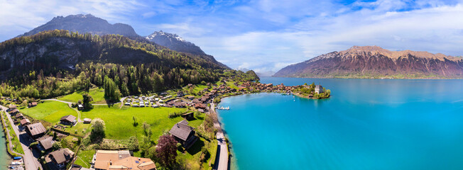 Stunning idylic nature scenery of lake Brienz with turquoise waters. Switzerland, Bern canton....