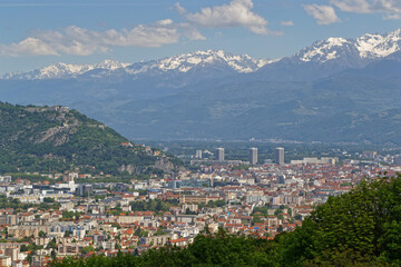 Fototapeta na wymiar GRENOBLE, FRANCE, May 11, 2022 : Gateway to the Alps, Grenoble was awarded European Green Capital for 2022, pioneering nature of its actions for ecological transition.