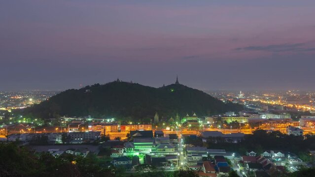 Time lapse video 4K, landscape ancient monarch's residence on the mountain and Phetchaburi city view Before dawn to early morning, Phra nakhon khiri historical park.