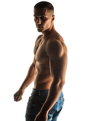 Fototapeta premium Posing from the back topless in studio while twisting