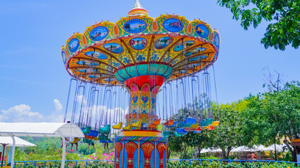 Children's attractions in the recreation park. Nha Trang city in Vietnam. Amusement Island on Vinpearl Island. 