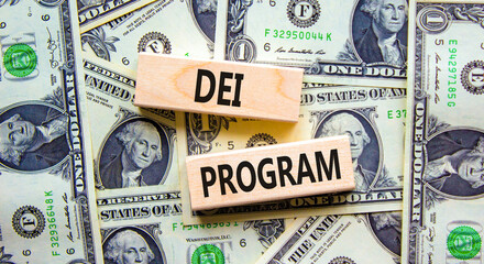 DEI diversity equity inclusion program symbol. Blocks with words DEI program on beautiful background from dollar bills. Business DEI diversity equity inclusion program concept. Copy space.