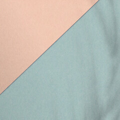 Fototapeta premium Diagonally split colour paper textures. Pastel colour background for your objects.