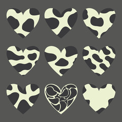 Fototapeta premium An illustration of nine hearts with spots like cows.