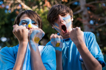 Fans of the Argentine national team shout the goals and celebrate during the 2022 World Cup.