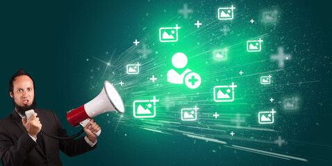Young person with megaphone and social networking icon