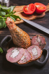 Slicing from a homemade artisan turkey meat, boiled and smoked with the addition of chicken fillet in the form of a turkey leg
