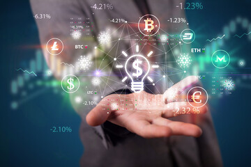 Businessman holding currency symbols concept