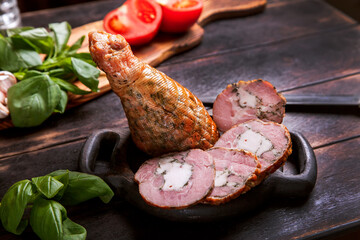 Slicing from a homemade artisan turkey meat, boiled and smoked with the addition of chicken fillet in the form of a turkey leg