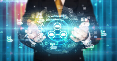 Businessman holding technology icon concept