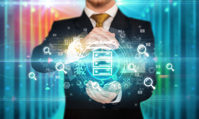 Businessman holding technology icon concept