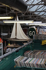 boat and books in a market