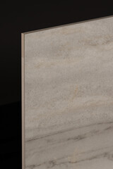 Porcelain tiles in the form of a marble on a dark gray background