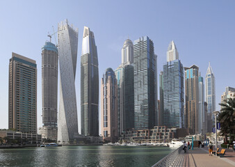 Naklejka premium Skyscrapers and artificial canal in Dubai Marina