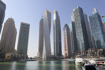 Fototapeta na wymiar Skyscrapers and artificial canal in Dubai Marina