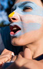 Argentine fan worried about his team.