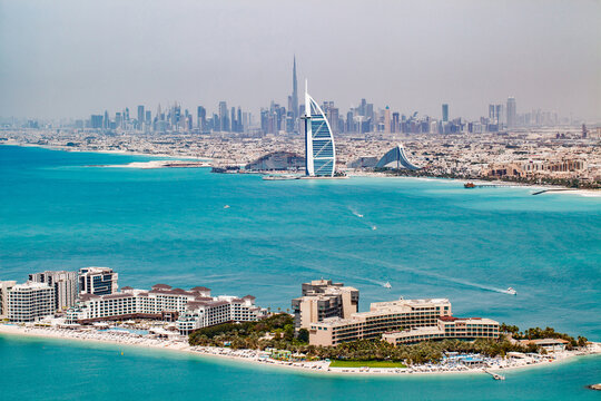 Dubai, UAE - April 18, 2022: view on center of Dubai, Burj Khalifa, Burj Al Arab, Jumeirah Beach Hotel, Rixos The Palm Hotel Suites, Taj Exotica.