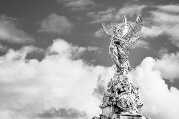 Victory Goddess golden statue on top of the Victoria Memorial located in front of Buckingham Palace...