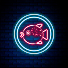 Glowing neon line Puffer fish on a plate icon isolated on brick wall background. Fugu fish japanese puffer fish. Colorful outline concept. Vector © vector_v